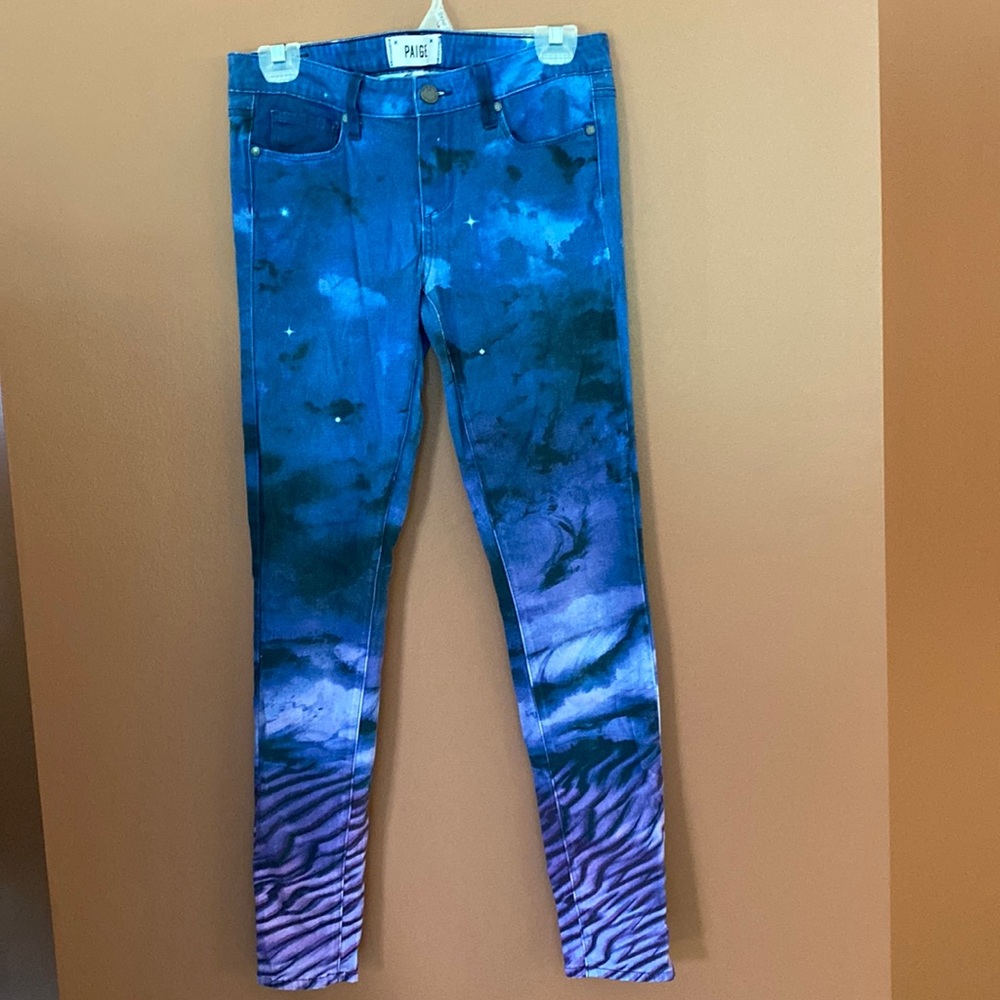 Paige denim ladies jeans with starry night type scene in size 27.